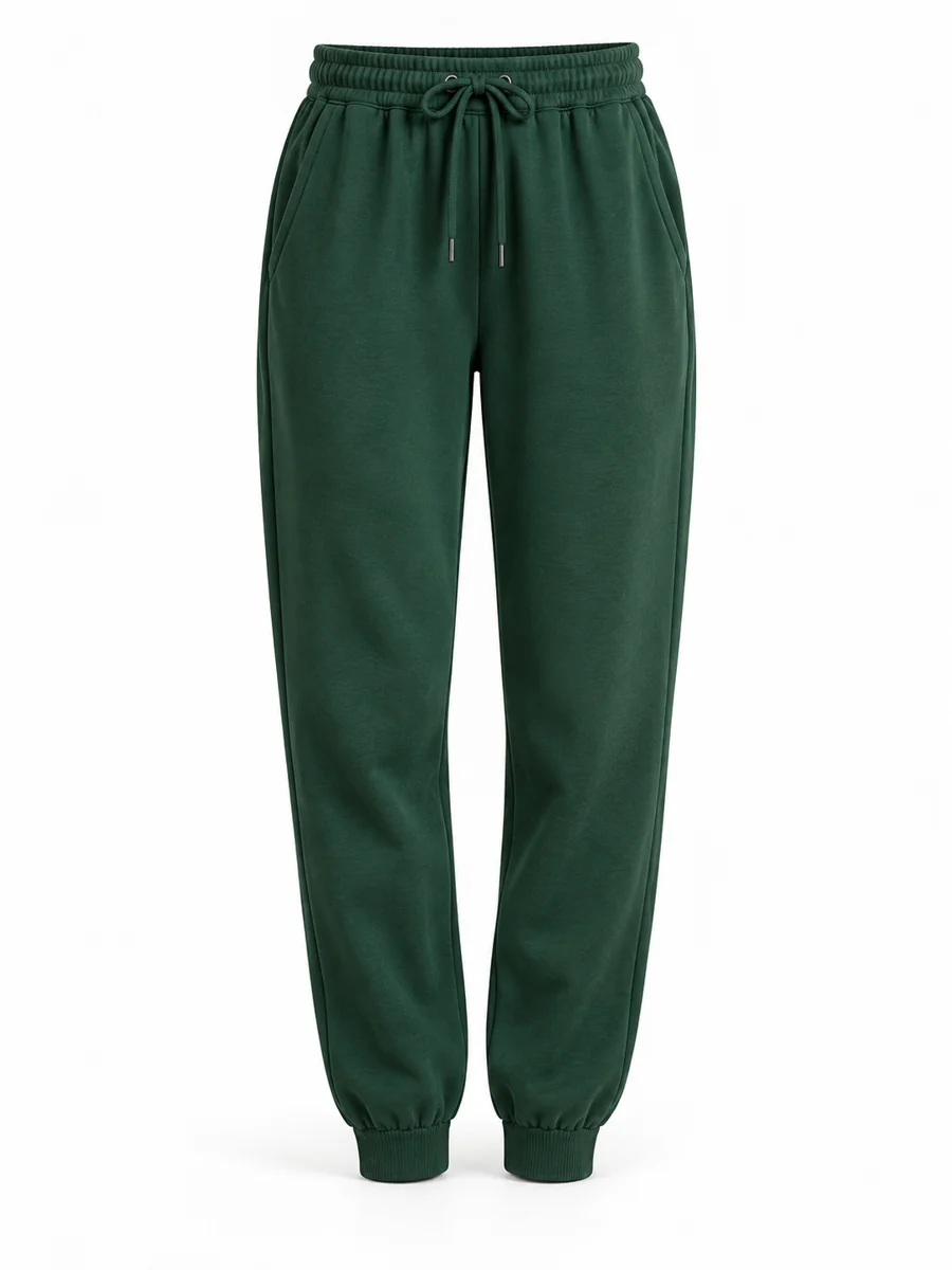 Relaxed track trousers, shown in Forest Green